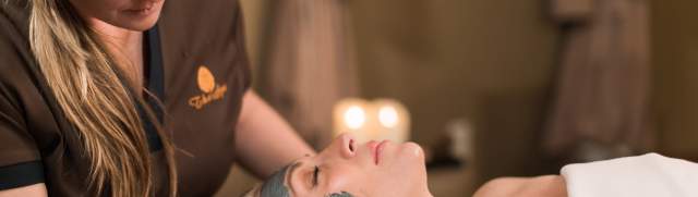 Woman during a facial spa appointment