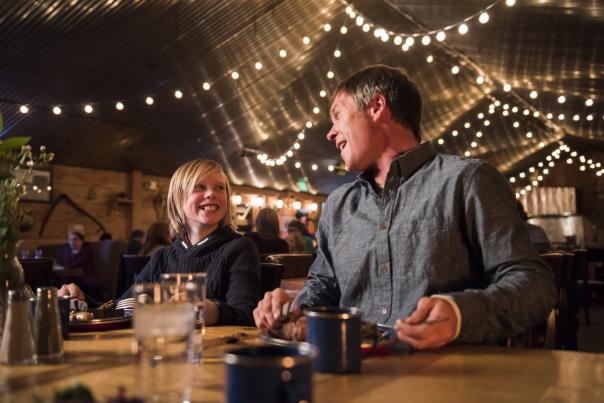 Family eating in a Yurt after sleigh ride