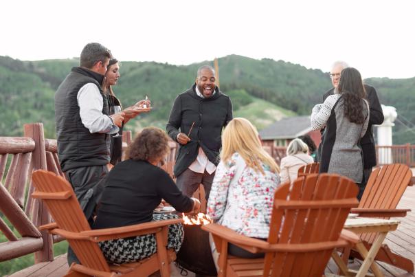 Group sitting on deck at Lookout Cabin