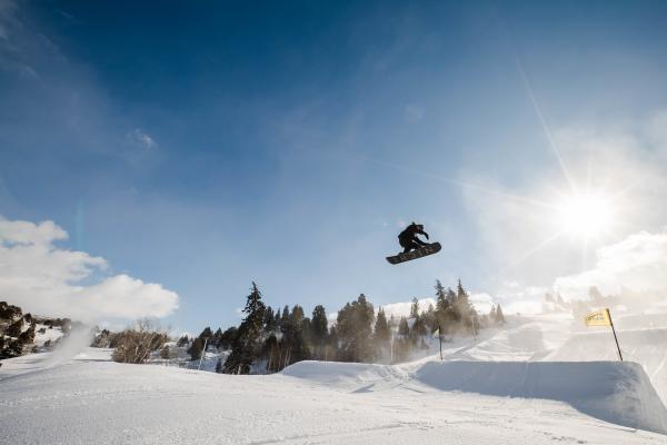 snowboarder going off a big jump