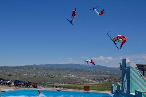 Freestyle Skiers Jump into a Pool at Utah Olympic Park