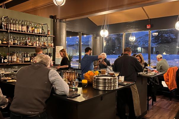 People eating and drinking inside the Tupelo restaurant in Park City, Utah