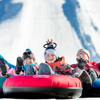 Family tubing down run together at Gorgoza Park