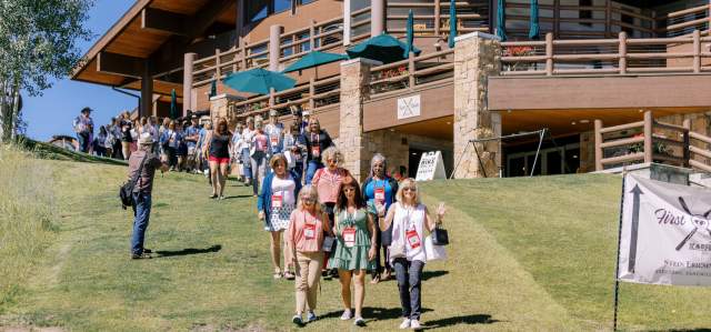 Group of people walking from Stein Eriksen Lodge