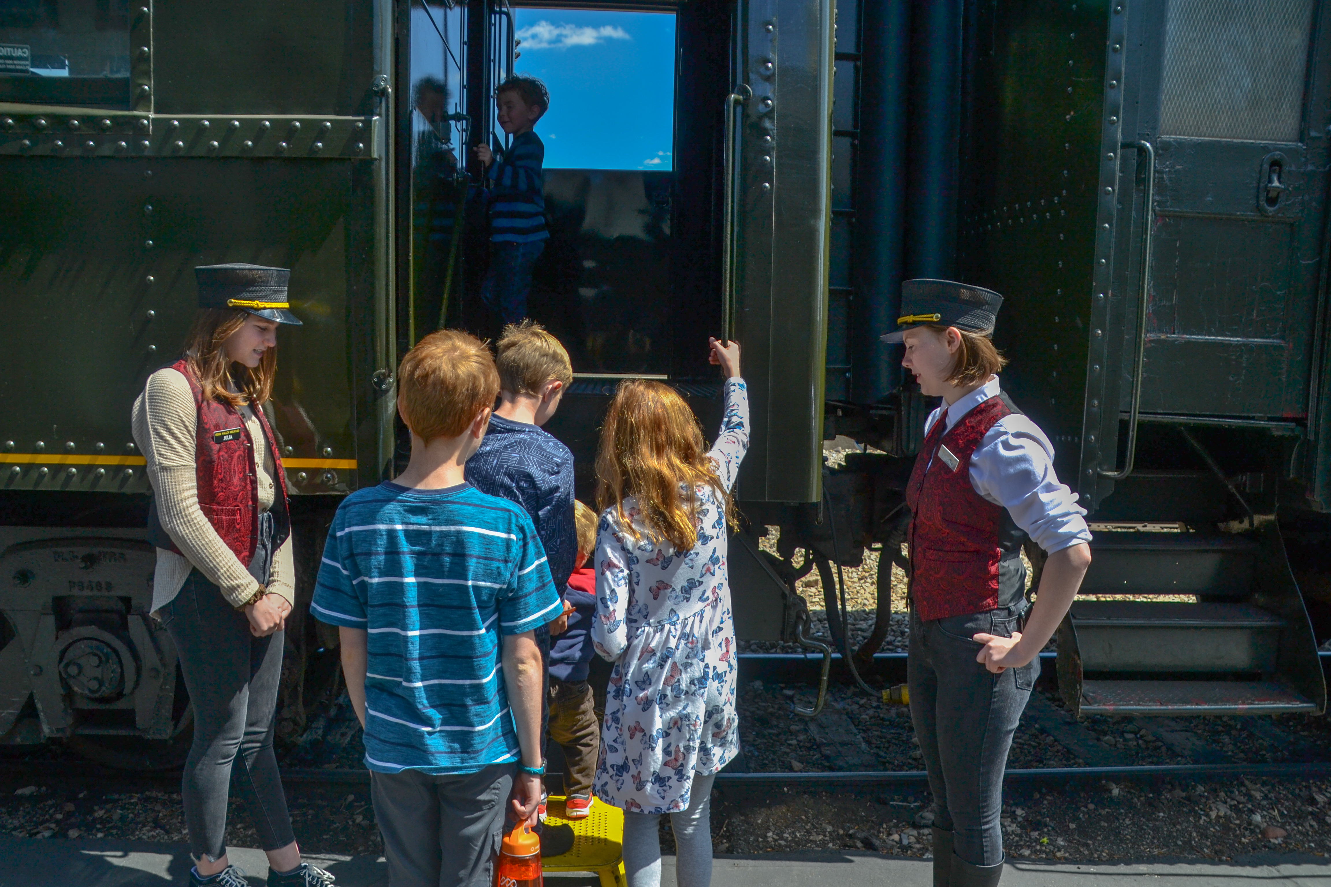 Kids Boarding a Train