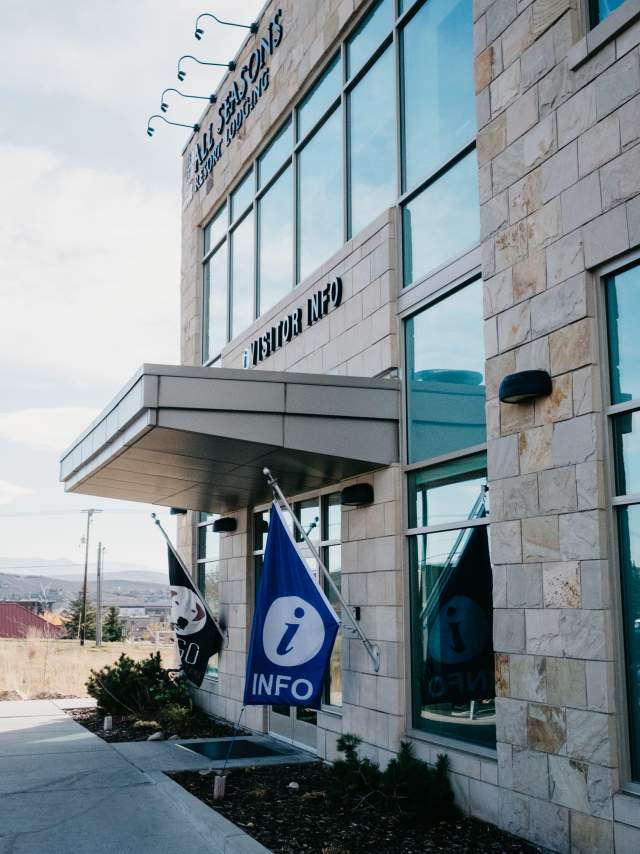 Exterior of Visitor Center with Information flag hanging