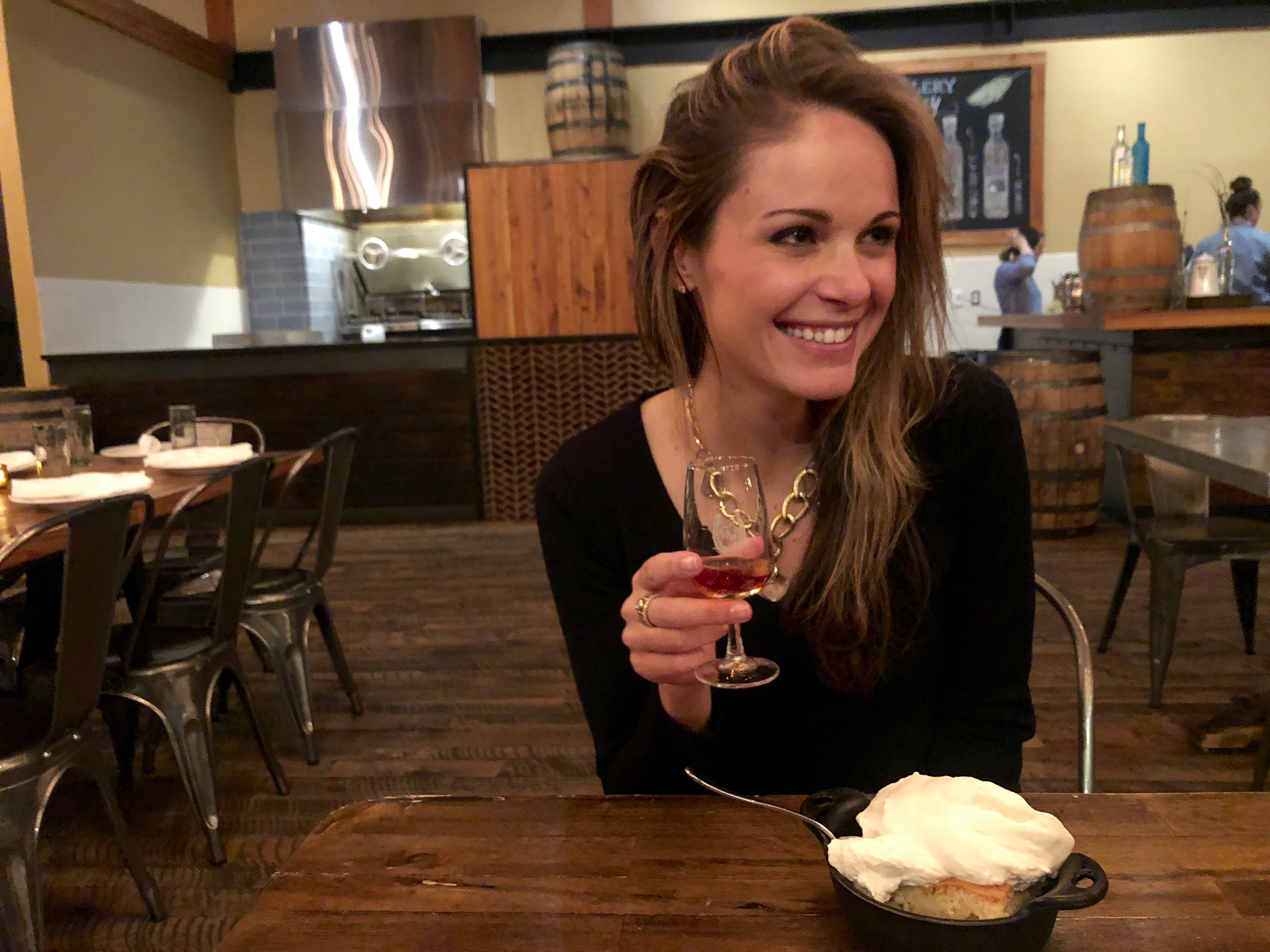 Writer Locke Hughes enjoying dessert and final whiskey taste