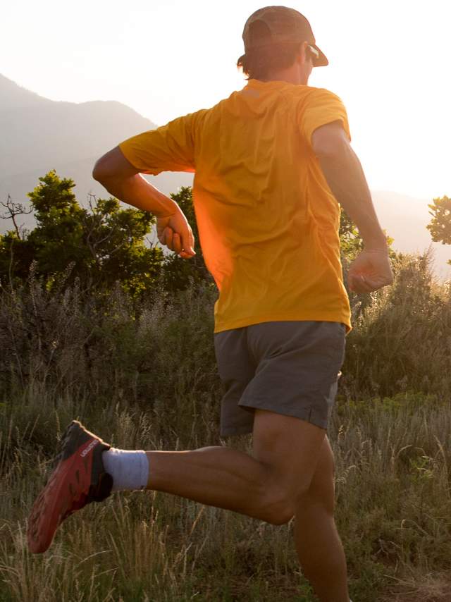 Man running on a trail