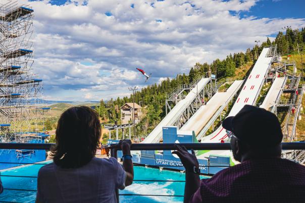 Two people enjoying the flying aces show