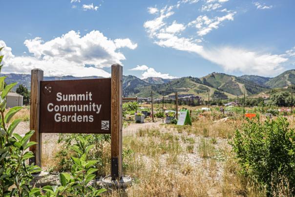 Wooden at the entrance of the Summit Community Gardens