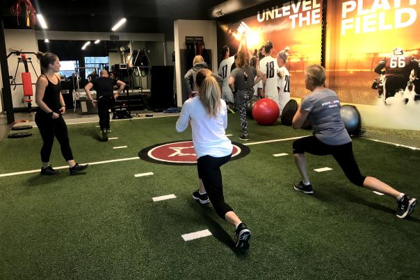 Group workout inside of Gym