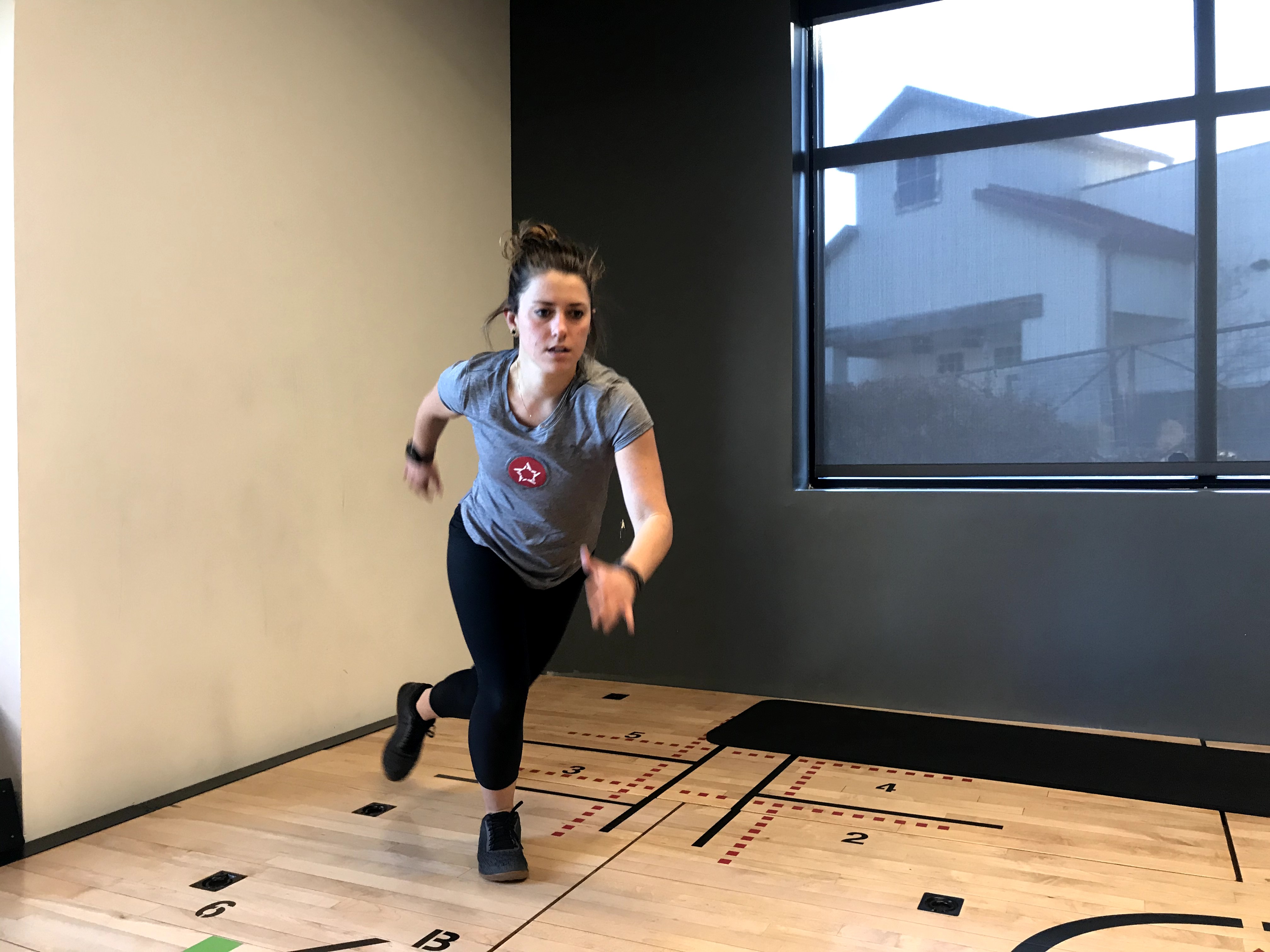 Instructor demonstrating "Skaters hold" exercise