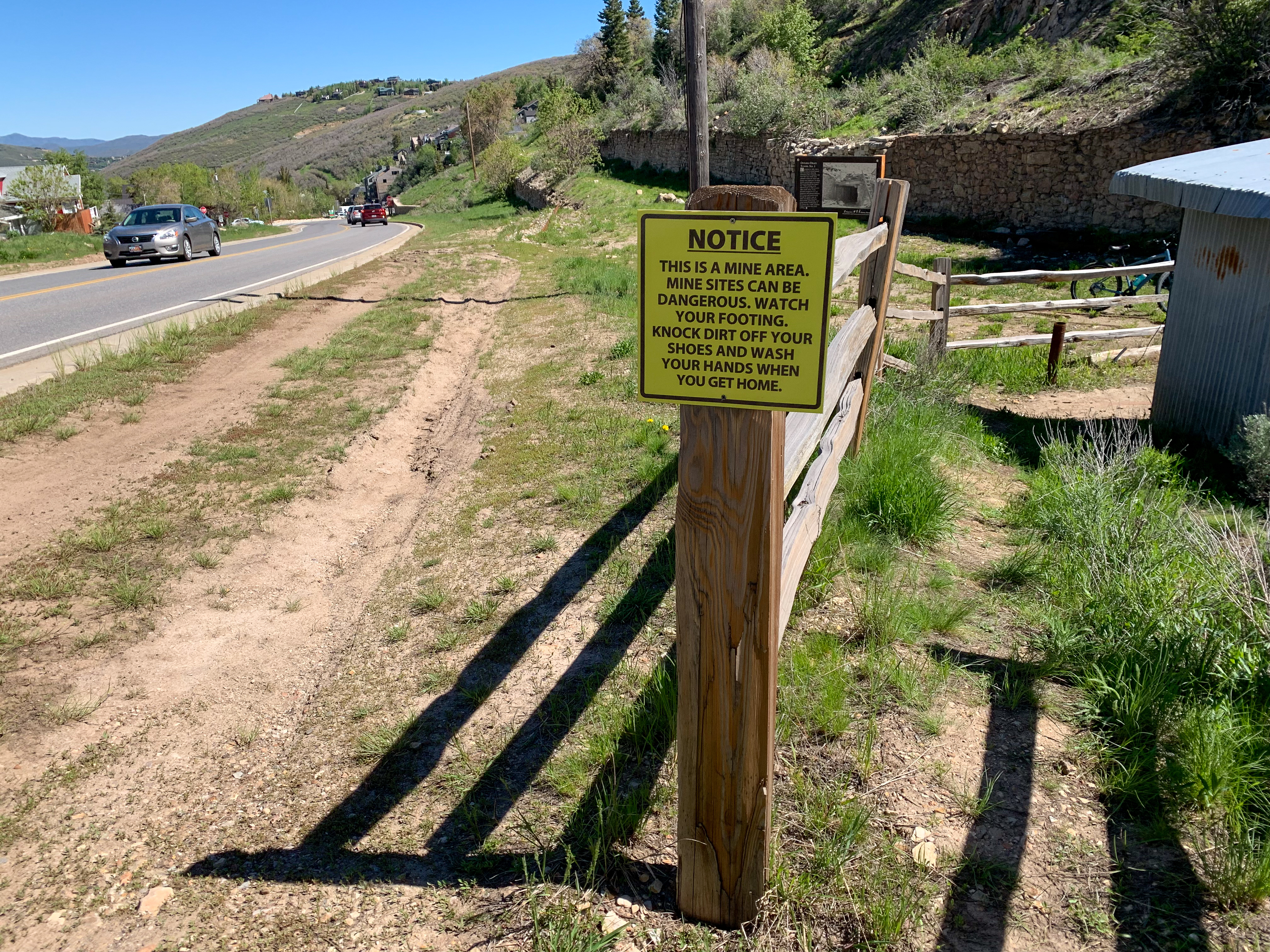 Warning Sign for Mine Site on side of the road