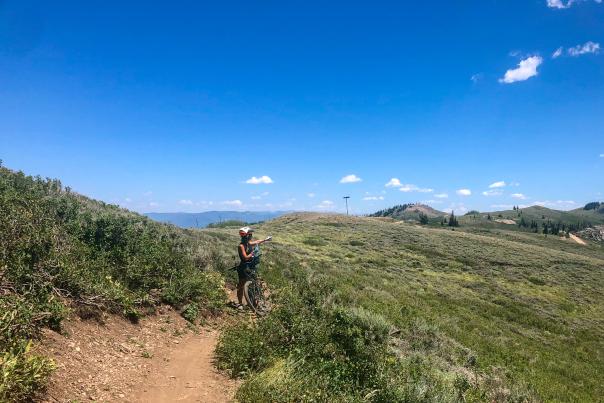 Mountain Biker enjoying the scenic view on mountain trail