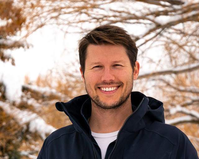 Jason Dundas smiling at camera