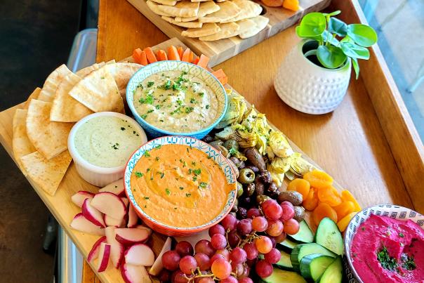 Mediterranean Food on a Table inside of NOSH Park City