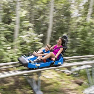 Mom and son on alpine coaster at Park City Mountain