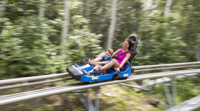 Mom and son on alpine coaster at Park City Mountain