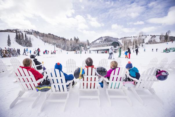 Family sitting at Ski Beach at Deer Valley Resort