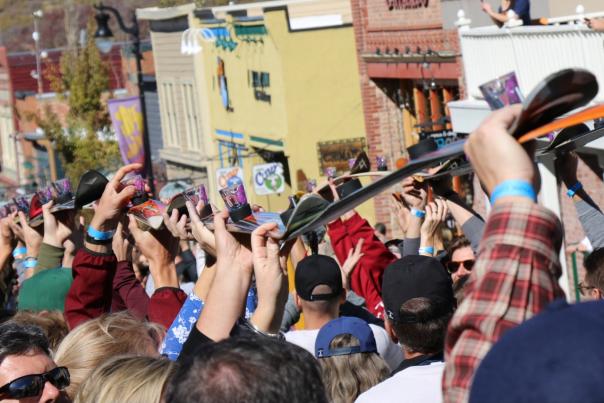 Crowd lift shot skis in the air