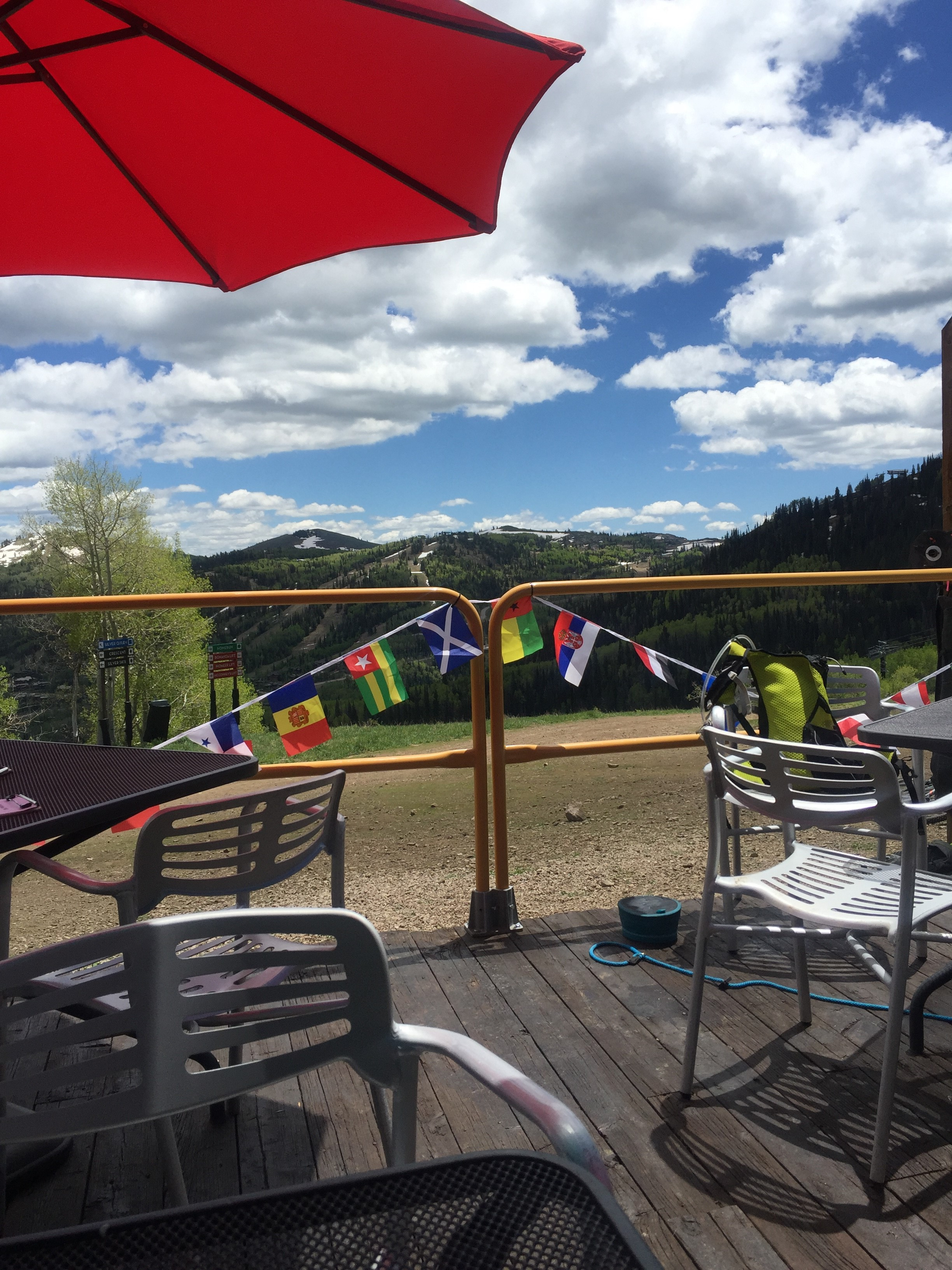 Outdoor patio chairs, table, and umbrella