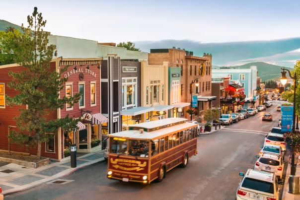 Historic Trolley driving up Historic Main Street in summer